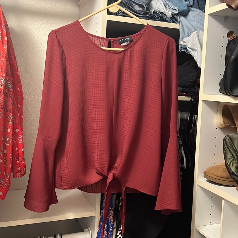 1. State blouse with bell sleeves